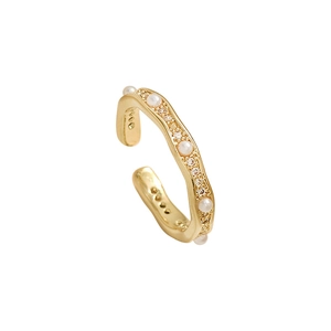 Adjustable gold ring with irregular wavy design featuring small pearls and zircons