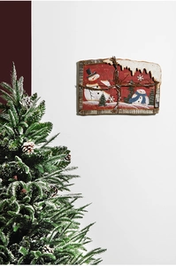 Close-up of vintage Santa wall art with faux snow detail and festive snowman scenery