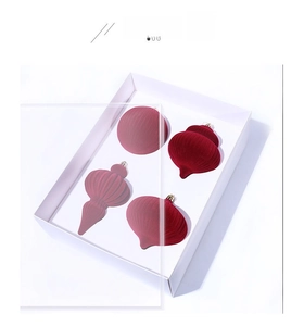 Set of four deep red velvet flocked Christmas tree ornaments in a white gift box