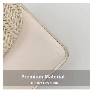 Close-up of off-white leather shoulder bag with circular woven details and precise stitching