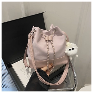 Pink PU leather drawstring bucket bag with silver chain strap and cute plush charm