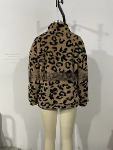 Close-up of leopard print faux fur jacket showing thick plush texture and high collar
