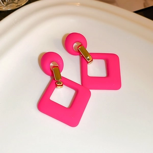 Modern hot pink geometric square earrings with gold accents and matte finish