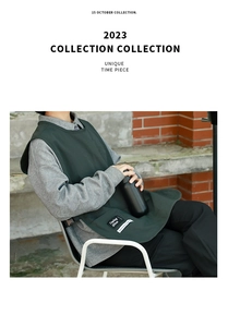 Detail of dark green apron vest featuring adjustable side buckles and decorative woven labels