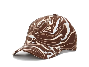 Detail of baseball cap showing brown marble texture and canvas fabric stitching