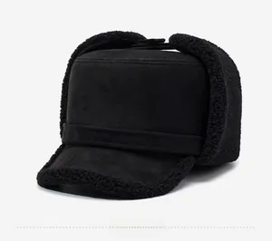 Detail of warm black Lei Feng hat showing soft faux lamb wool lining and suede texture