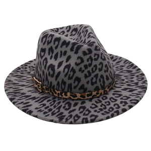 Detail of leopard print felt fedora featuring grey base and decorative buckle band