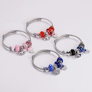 Adjustable stainless steel Evil Eye and Hamsa Hand beaded bangles in multiple colors