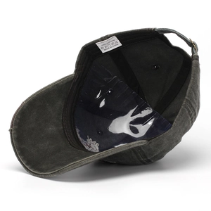 Dark grey washed cotton baseball cap with M embroidery showing interior sweatband details