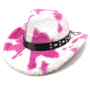 Pink cow print plush cowboy hat with studded leather band and soft faux fur texture