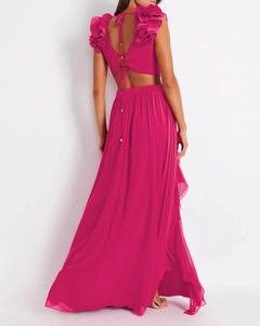 Close-up of back tie-up detail on a rose red ruffled top with layered long skirt