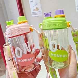 Close-up of portable pink and green dual-drink plastic cups with cute animal ears