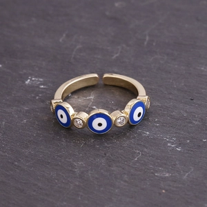 Adjustable gold plated evil eye ring with blue enamel and cubic zirconia stones