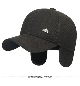 Detail view of winter baseball cap with ear flaps and thick lining for cold protection