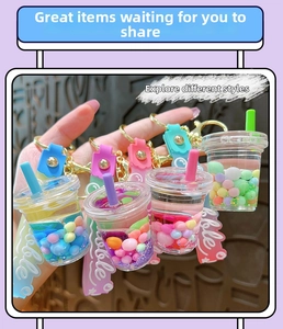 Detailed close-up of bubble tea liquid quicksand keychains in four vibrant colors