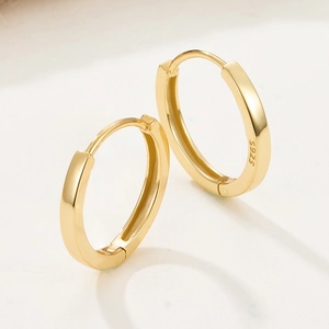 Minimalist 925 sterling silver hoop earrings in gold finish with a high-polished mirror effect