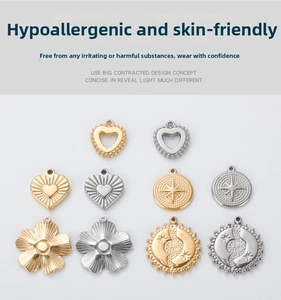 Detailed view of assorted stainless steel heart and star pendants in gold and silver finish