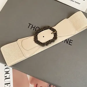 Ceinture large élastique vintage avec boucle baroque en bronze et détails en similicuir