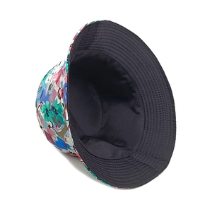 Detailed close-up of colorful floral sun hat featuring reinforced brim stitching and wide visor