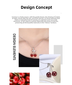 Close-up of S925 sterling silver necklace featuring red cherry fruit pendant on a model