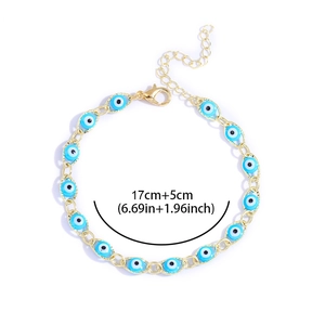 Detail of evil eye bracelet with 17cm gold chain and 5cm adjustable extension link