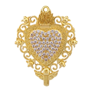 Macro shot of gold-plated heart pendant with crown design and pavé cubic zirconia