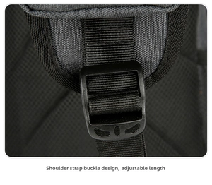 Detail of adjustable shoulder strap buckle and breathable mesh on black crossbody bag
