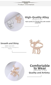 Detail of gold and silver alloy reindeer napkin rings with smooth and shiny finish