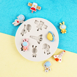 Space themed astronaut and rocket silicone mold for DIY cake and chocolate decoration