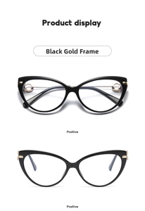Front view of black and gold cat-eye glasses frames with fine metal temples and CE mark