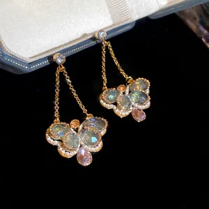 Vintage crystal butterfly drop earrings with colorful stones and silver needles