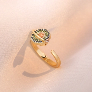 Gold open ring featuring a galaxy-inspired sphere with colorful pavé cubic zirconia