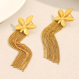 Detail of 18K gold-plated stainless steel flower earrings with golden bead tassels