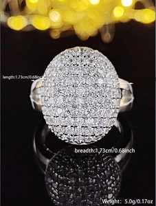 Top view of luxury dome ring with micro-pave cubic zirconia measuring 1.73cm wide