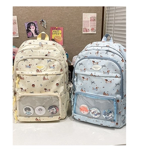 Detail of cute dachshund print backpacks in beige and blue colors with clear display windows