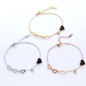 Elegant stainless steel heart charm bracelets set in gold, silver, and rose gold finishes