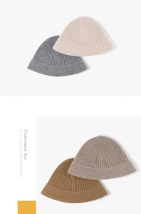 Detailed knit texture of wool blend bucket hats in beige, grey, oatmeal, and caramel colors