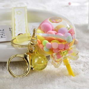 Creative yellow lollipop keychain with colorful candy beads and Sakura silicone charm strap