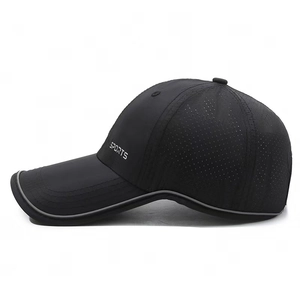 Lightweight breathable black sports cap with reflective trim and laser-cut ventilation