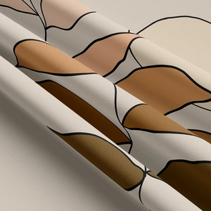 Gros plan sur la texture du tissu doux avec des motifs de feuilles et détails tissés