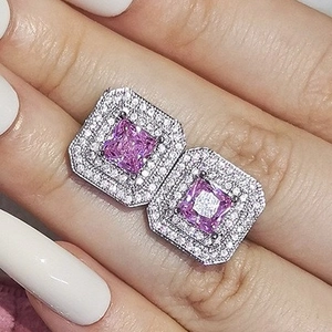 Elegant silver square stud earring featuring a pink princess cut stone and double halo