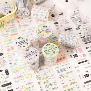 Detailed spread of decorative washi tape rolls and stickers with artistic floral motifs