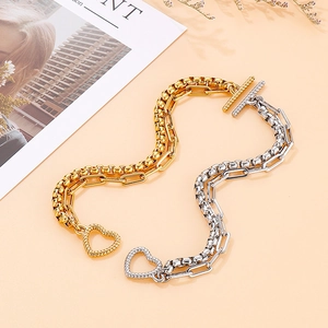 Double-layered stainless steel heart bracelet with OT toggle clasp in gold and silver