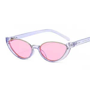 Chic cat-eye sunglasses with purple translucent frames and pink lenses for women