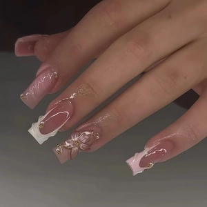 French style press-on nails featuring 3D floral relief and leopard patterns on long coffin shape