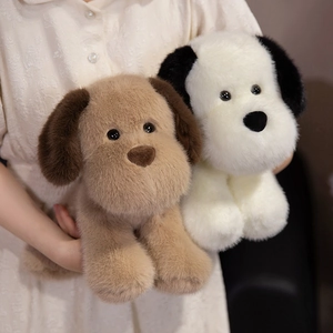 Peluche realistico di cucciolo di Golden Retriever seduto in morbida pelliccia sintetica