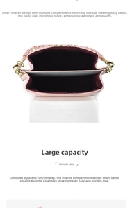 Detailed interior view of pink shoulder bag showing three compartments and premium lining