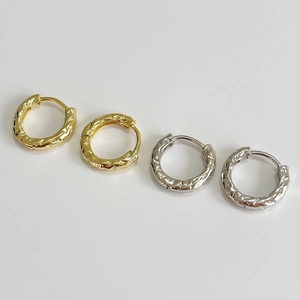Minimalist S925 sterling silver earrings with irregular lava texture in gold and silver