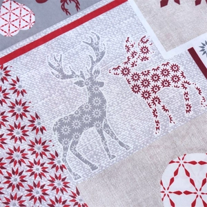 Detailed view of Christmas table runner with reindeer and snowflake print texture