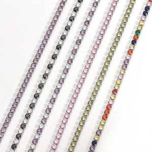 Macro shot of stainless steel tennis chains with multicolored zircon stones in various colors